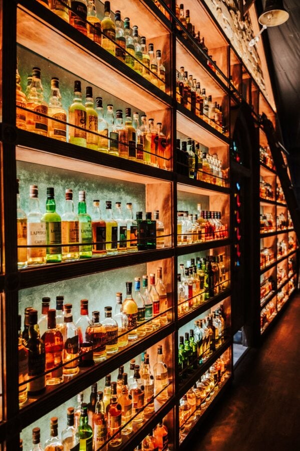 Julep's wall of whiskey bottles